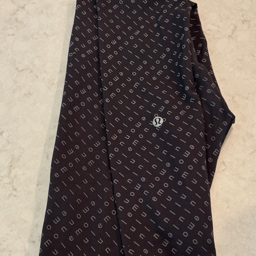 Lululemon Wunder Train High Rise Leggings SZ 2 Black Logo Print All Over